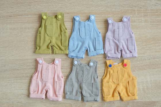 Produttore OEM/Odm Pantaloni per bambole Costumi gonne Accesso a bambole Prezzi Rimuovibili Abbigliamento per bambole personalizzato